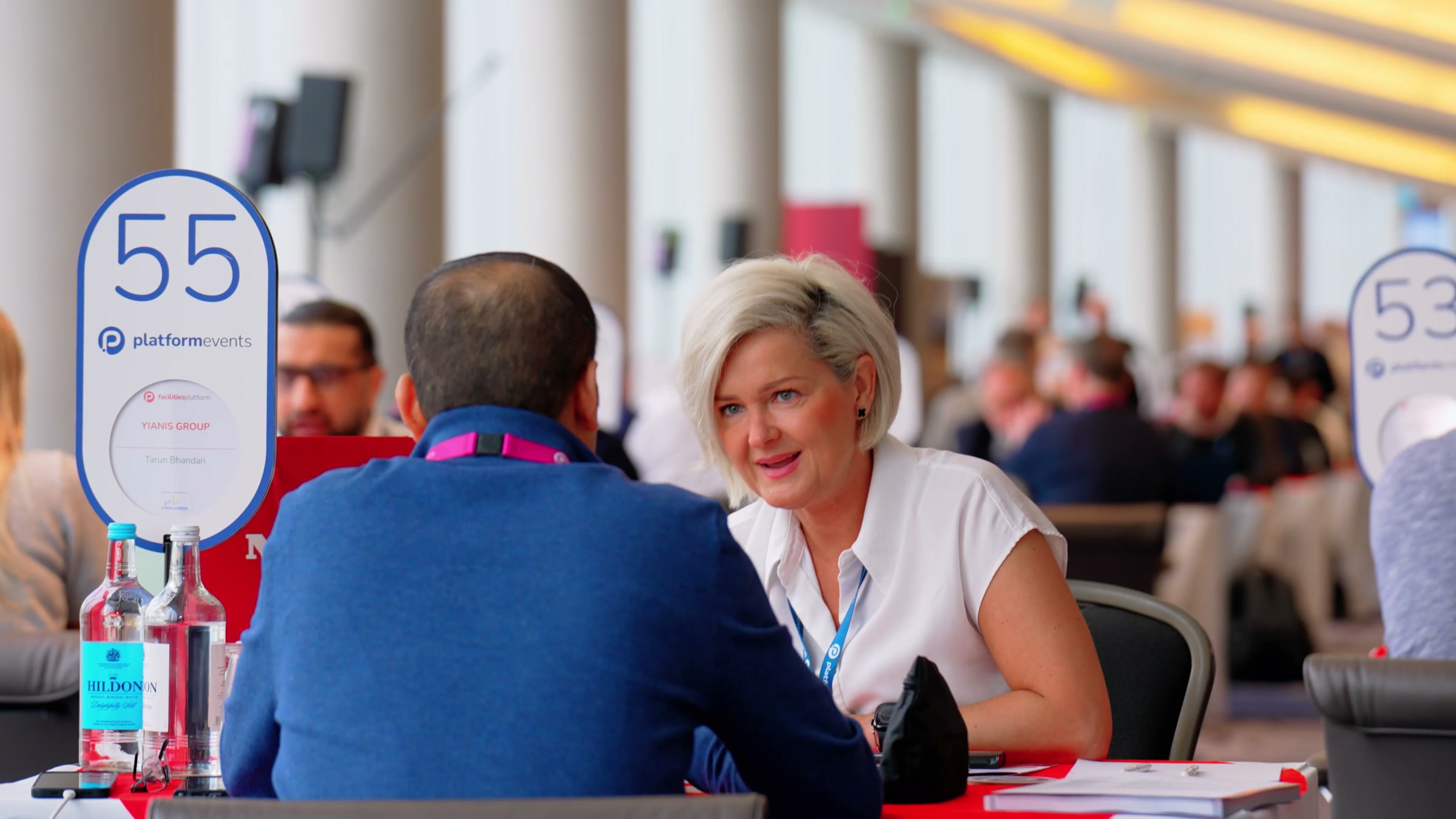 A face-to-face conversation at a live business event