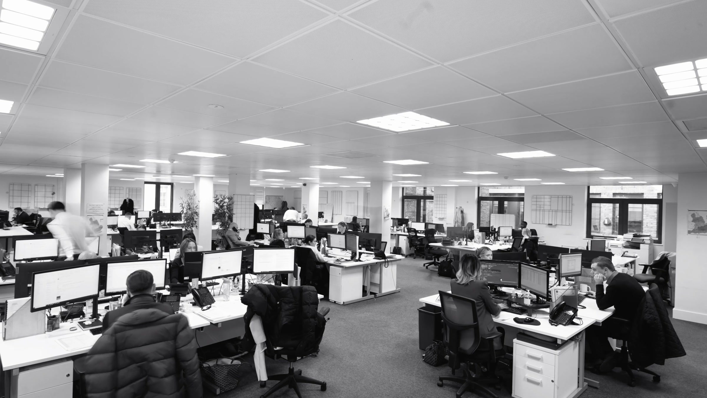 A busy workplace captured for a corporate film